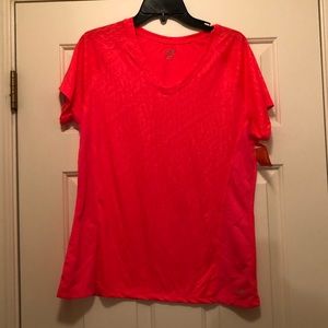 Two athletic tops one with tags other never worn